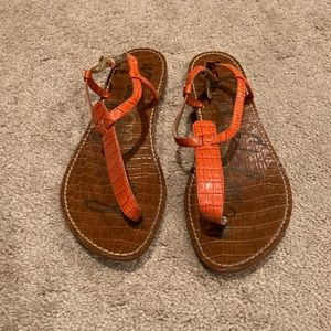 Sam Edelman orange embossed skin print thong sandal.